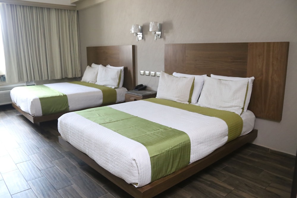 Executive Quadruple Room - Photo 1