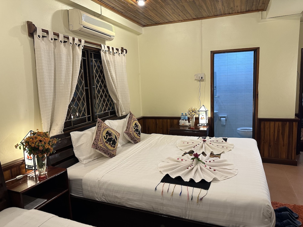 Deluxe Triple Room - Photo 10