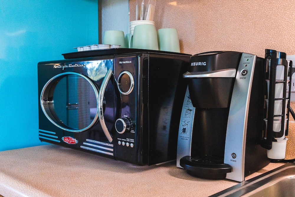 Retro microwave and Keurig coffee maker on counter