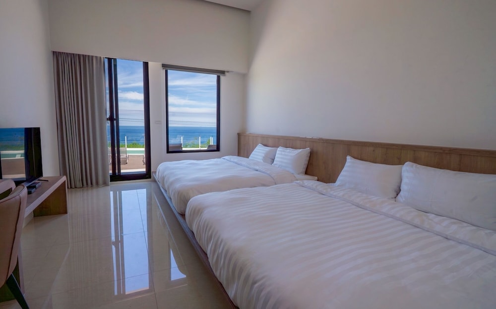 Panoramic Quadruple Room, 2 Queen Beds, Ocean View photo 1