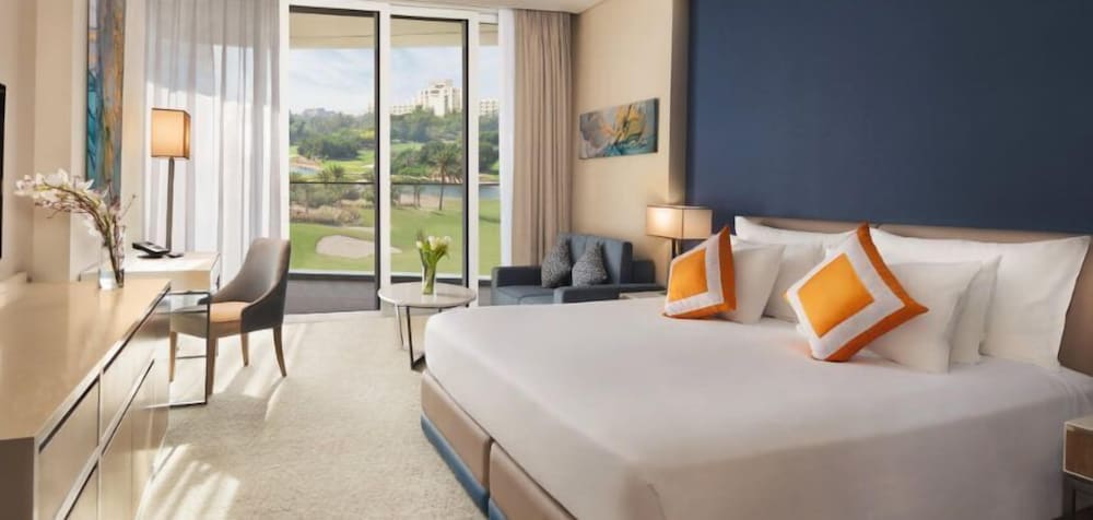 Golf Course View Room - King Bed with Access to Three Pools & Complimentary Mall Shuttle