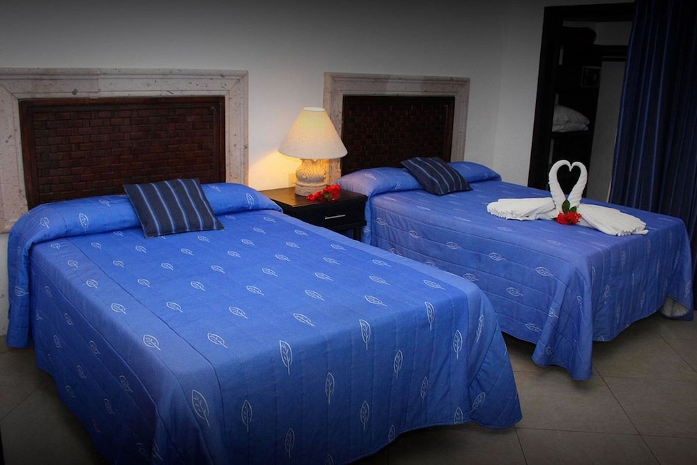 Suites 2 matrimoniales con cocineta vista alberca - tobogan