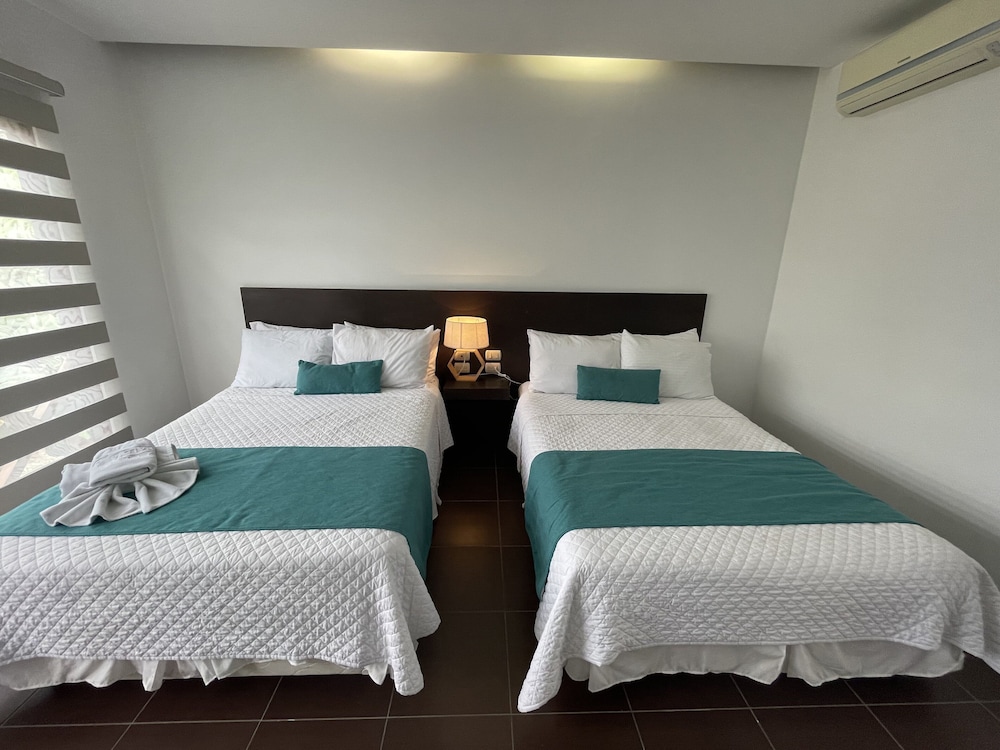 Superior Quadruple Room, 2 Double Beds, Refrigerator, Resort View photo 1