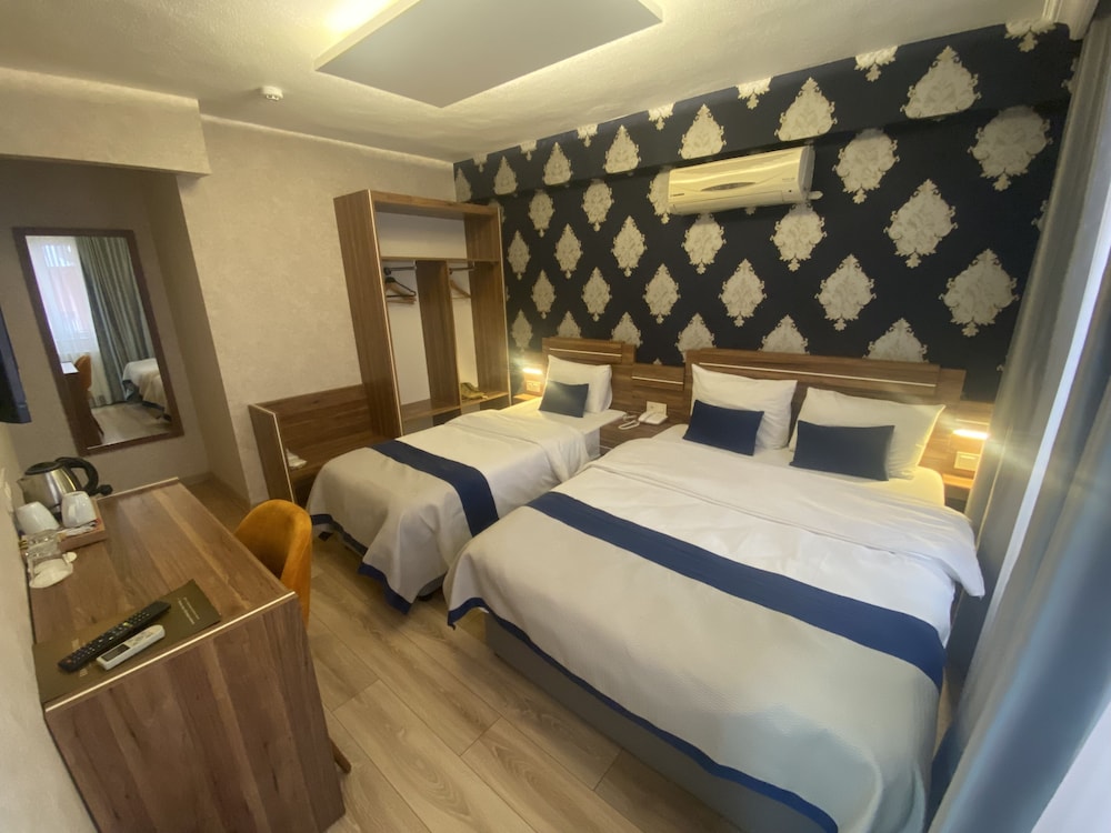 Standard Triple Room, Multiple Beds photo 2
