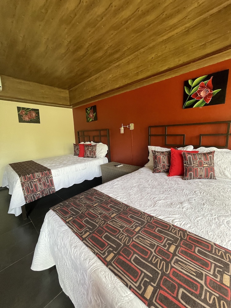 Deluxe Quadruple Room, 2 Double Beds, Garden View