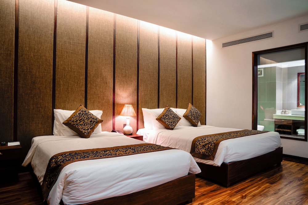 Deluxe Triple Room - Photo 9