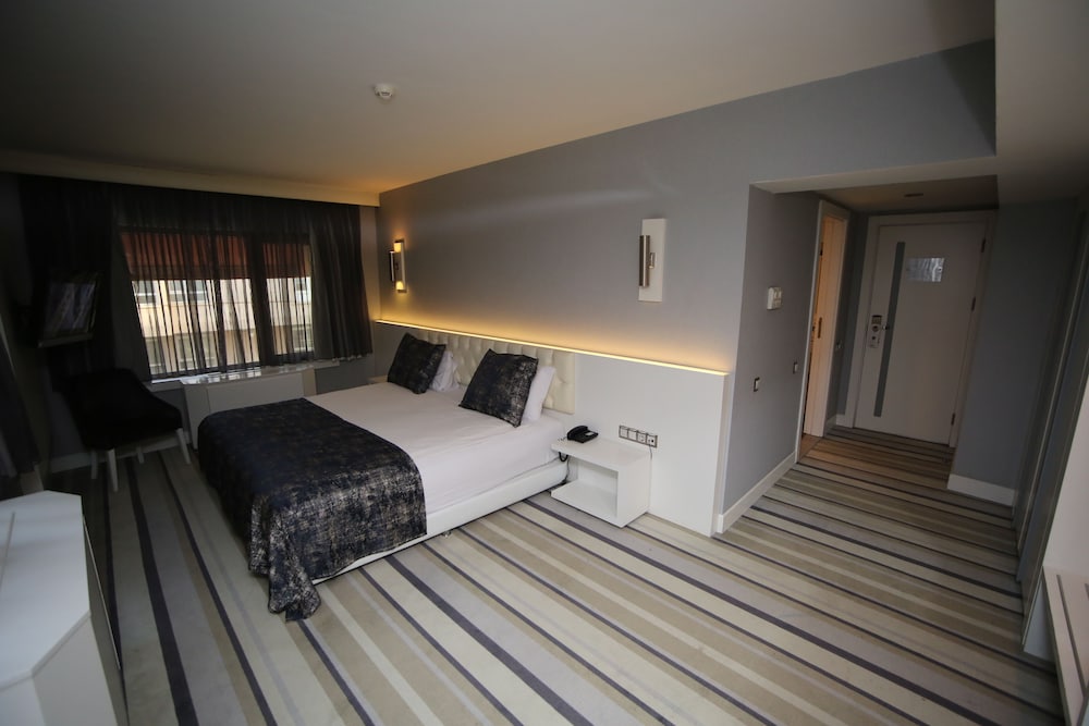 Deluxe Room - Photo 2