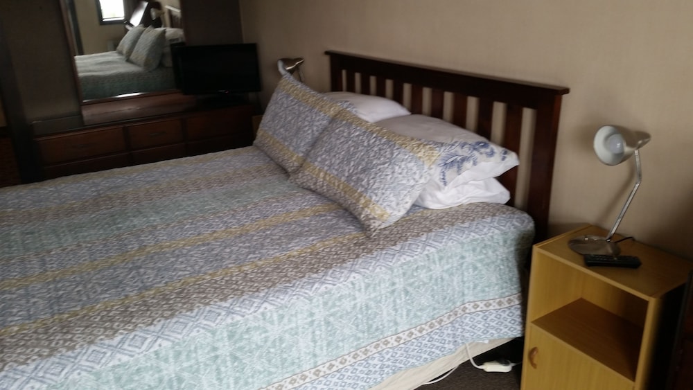 Queen Ensuite Room with Balcony photo 1