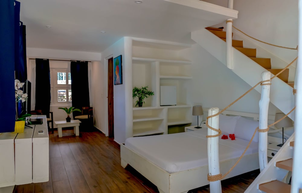 Deluxe Quadruple Room, Garden View, Garden Area photo 3
