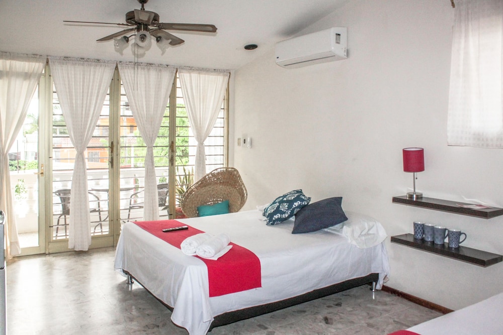 Junior Quadruple Room, 2 Queen Beds, Balcony photo 1