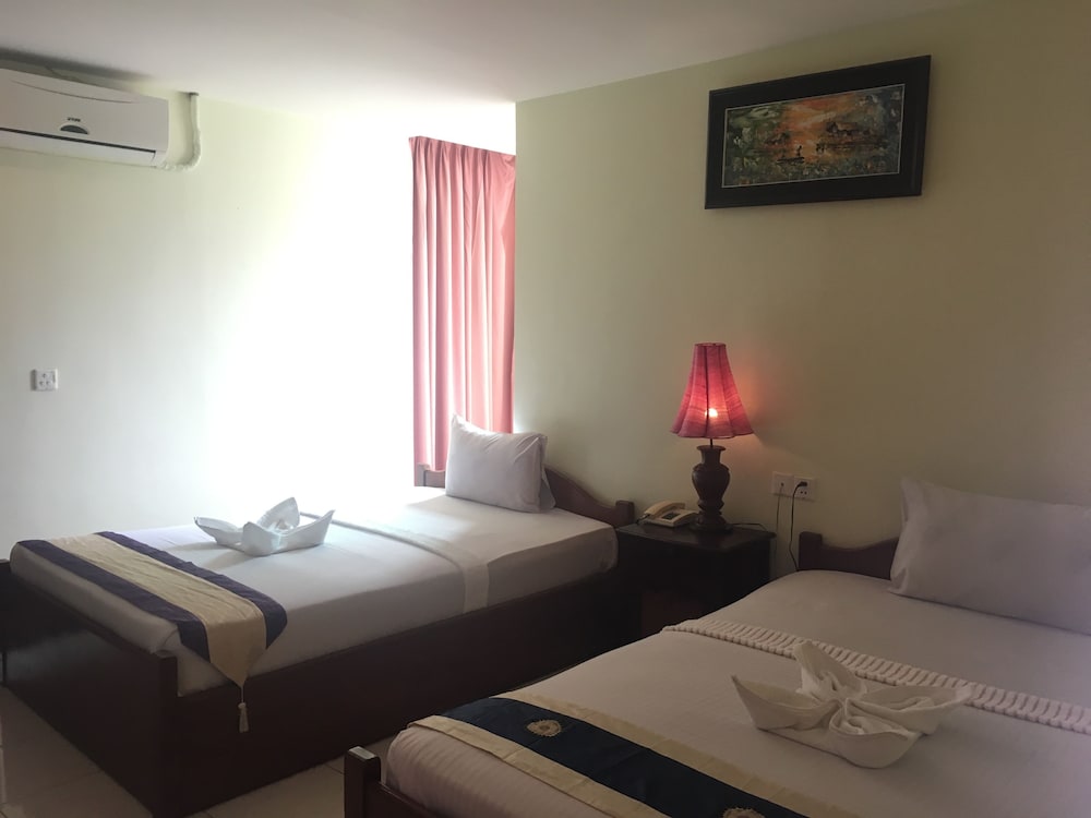 Standard Twin Room - Photo 8