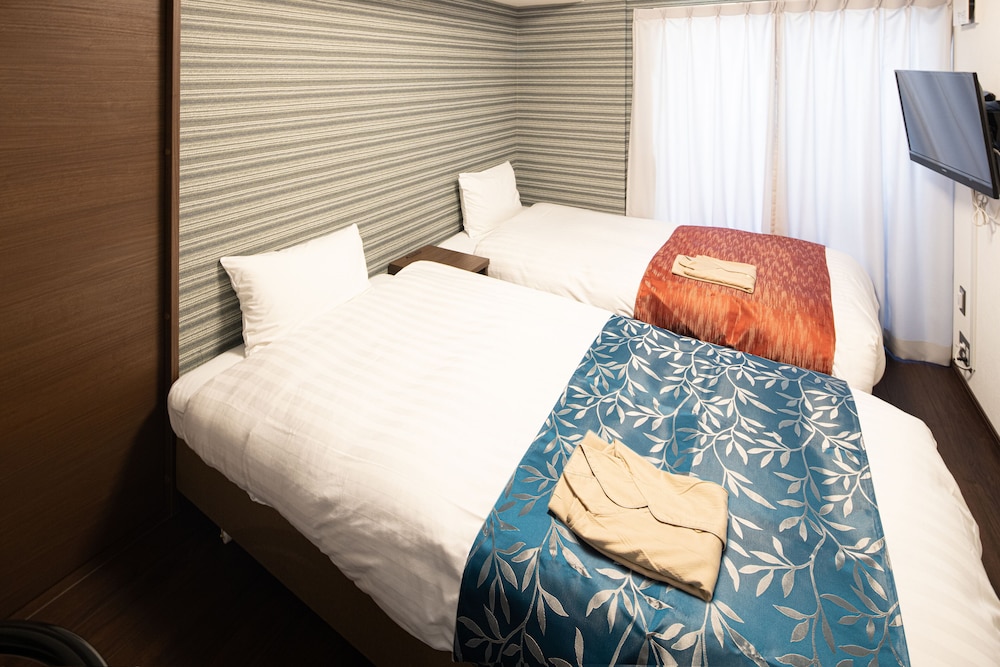 Standard Twin Room - Photo 7