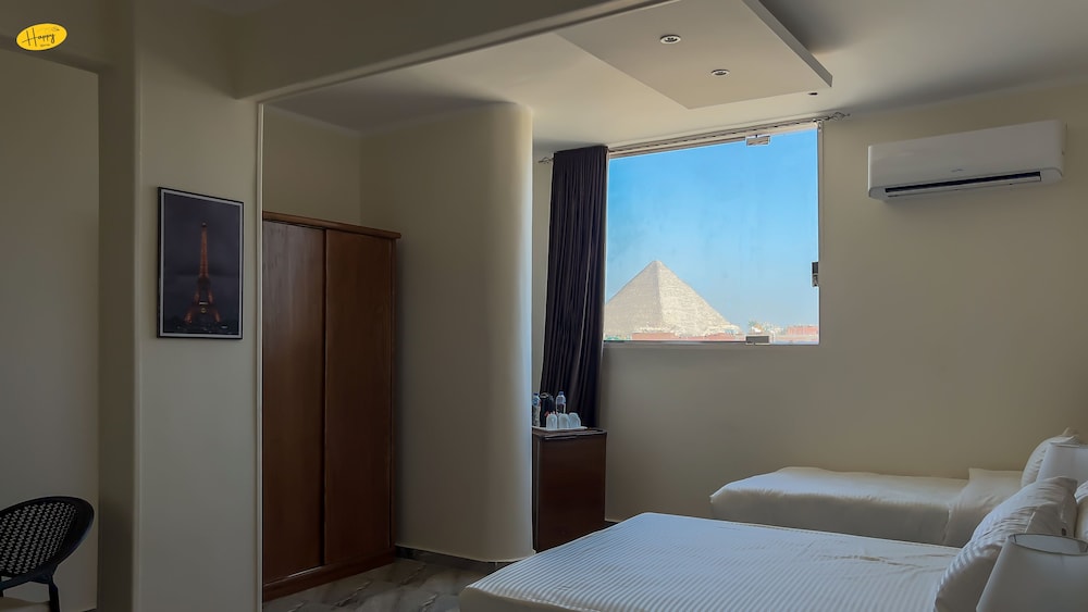 Exclusive Quadruple Room, 2 Queen Beds, Mountain View photo 2