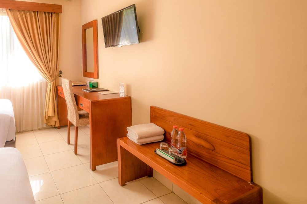 Deluxe Room - Photo 10