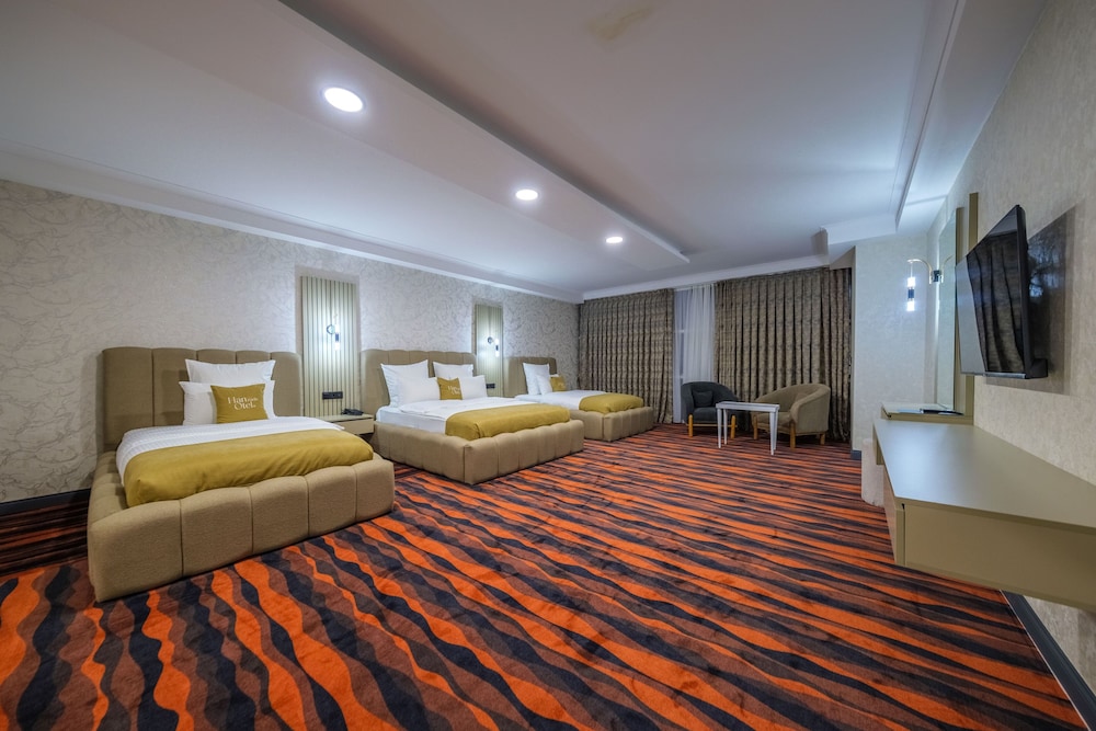 Deluxe Quadruple Room, Housekeeping, Mountain View photo 1
