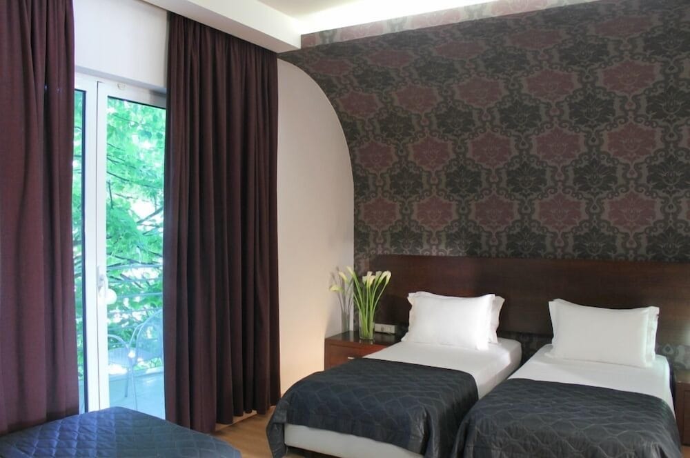 Triple Room - Photo 1