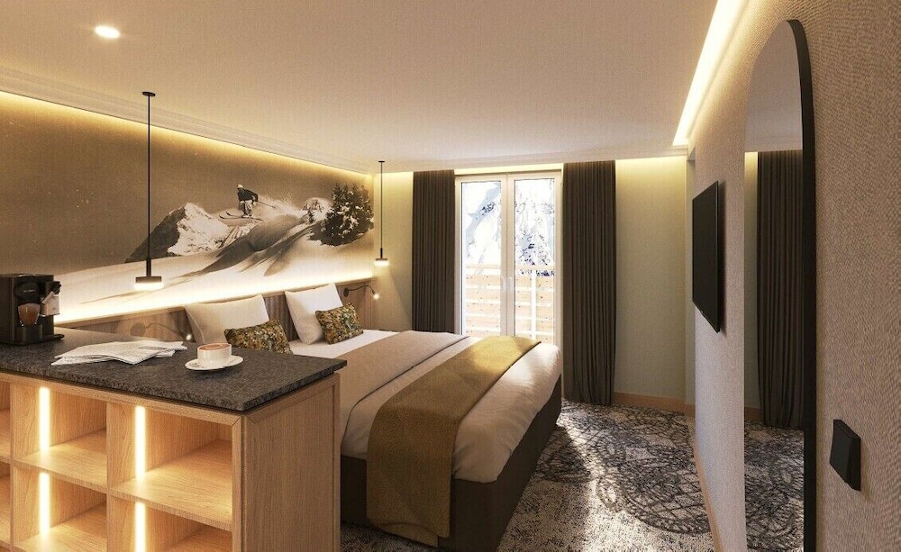 Corner Junior Suite with balcony and Eiger mountain view
