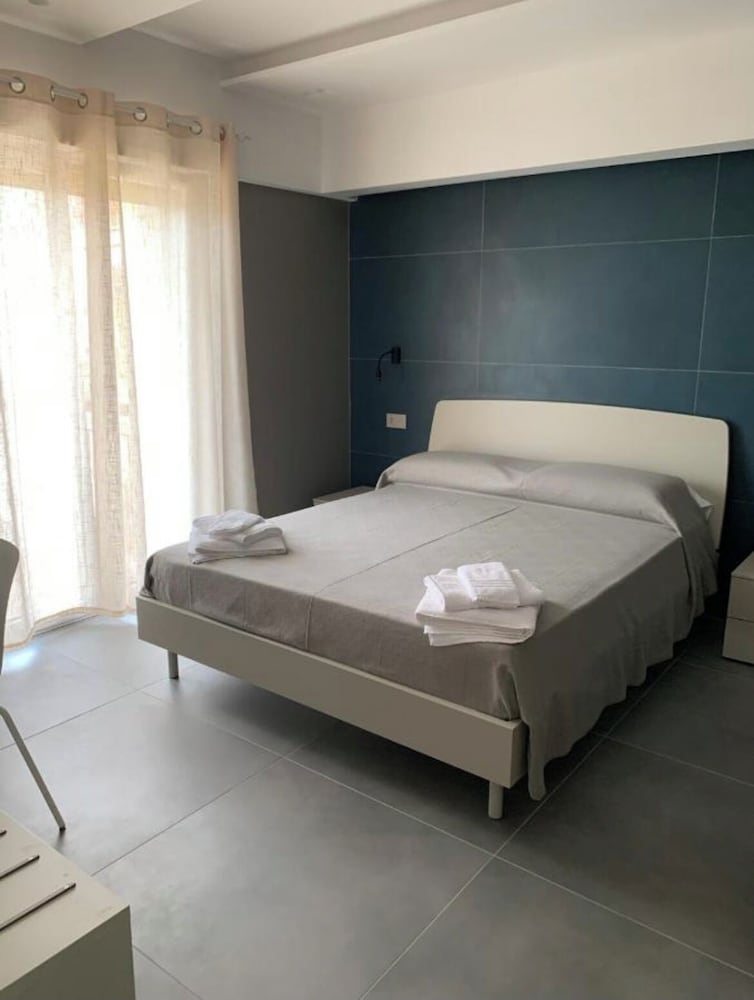 Basic Triple Room, Multiple Beds photo 3
