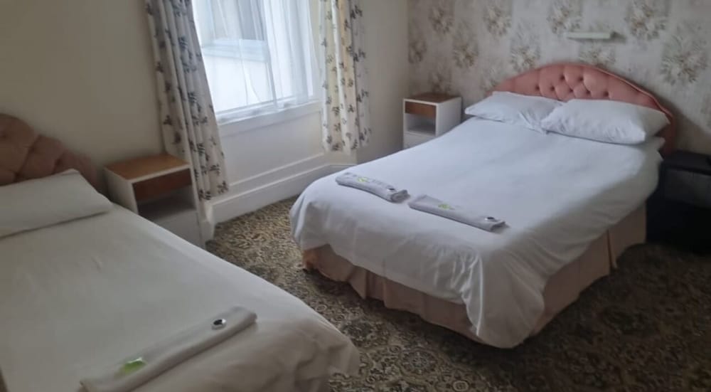 Standard Quadruple Room, Private Bathroom - Photo 1