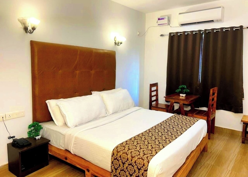 Deluxe Room - Photo 10