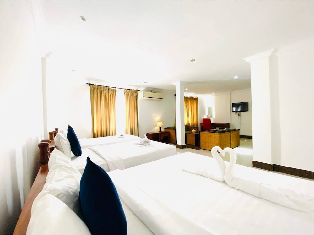 Deluxe Triple Room - Photo 6