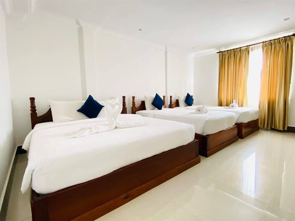 Deluxe Triple Room - Photo 1