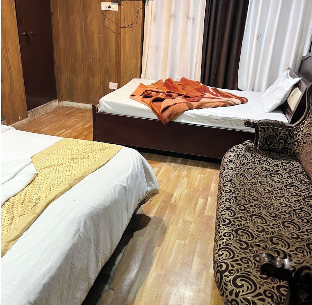 Deluxe Quadruple Room, City View