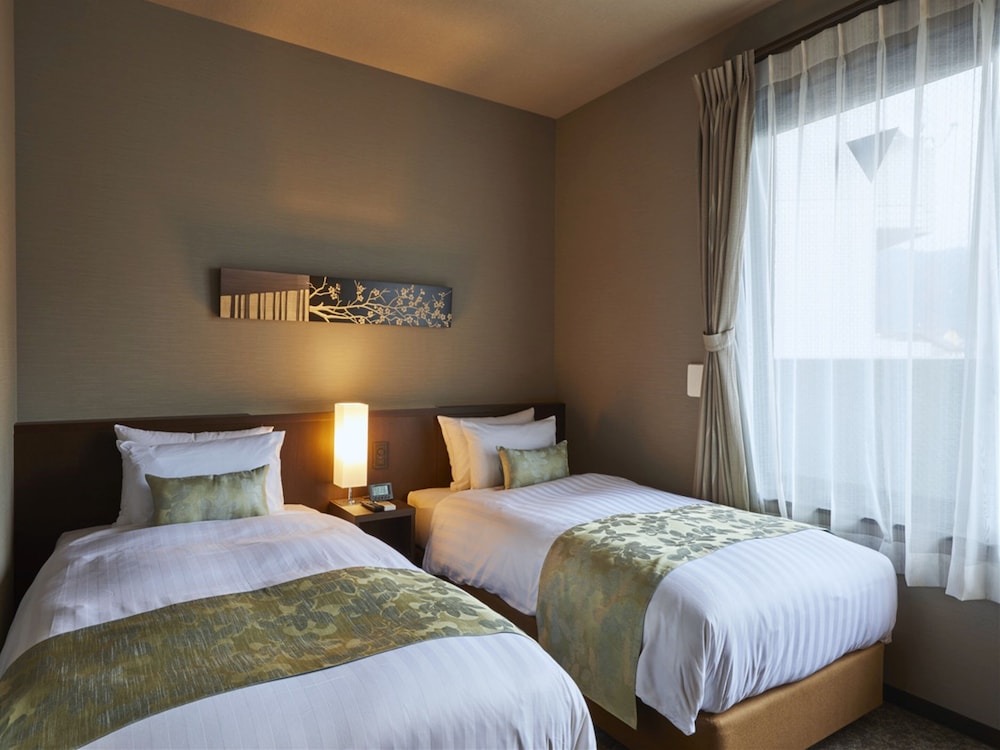 Standard Twin Room - Photo 11