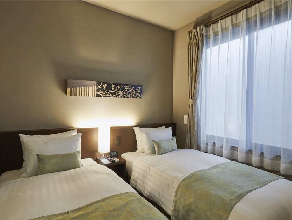 Standard Twin Room - Photo 10