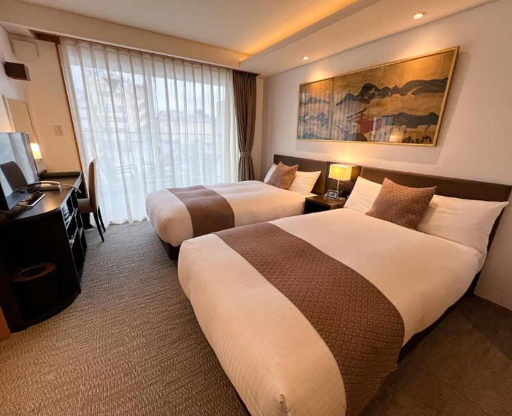Premium Twin Room - Photo 16