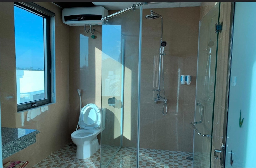 Deluxe Quadruple Room - Photo 8