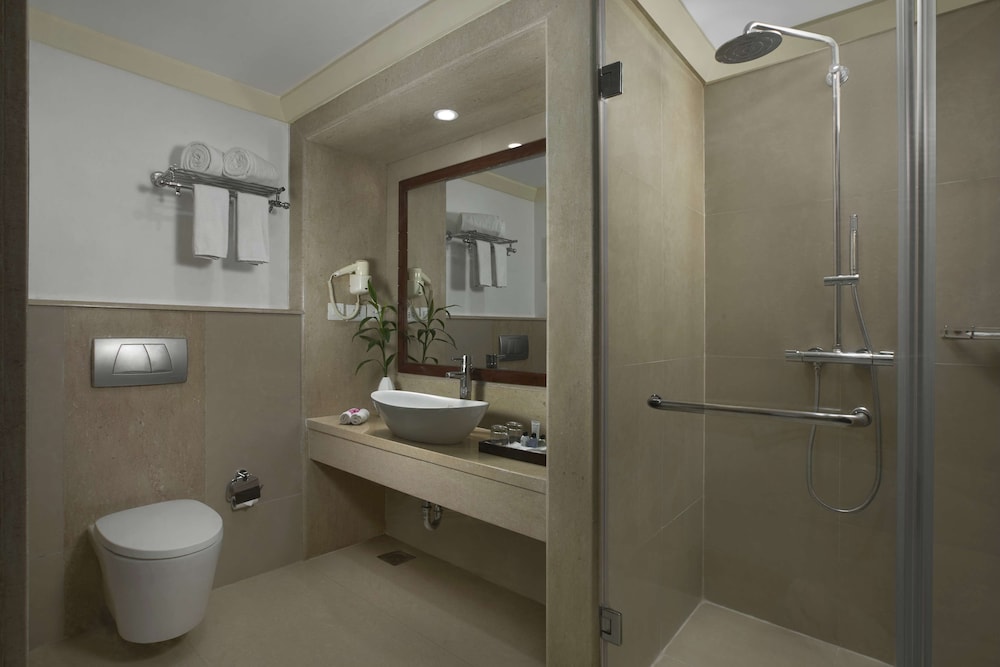 Executive Suite with Balcony and Partial Garden View