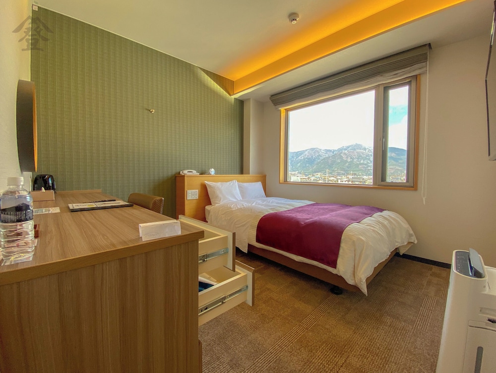 Semi-double room (top floor)