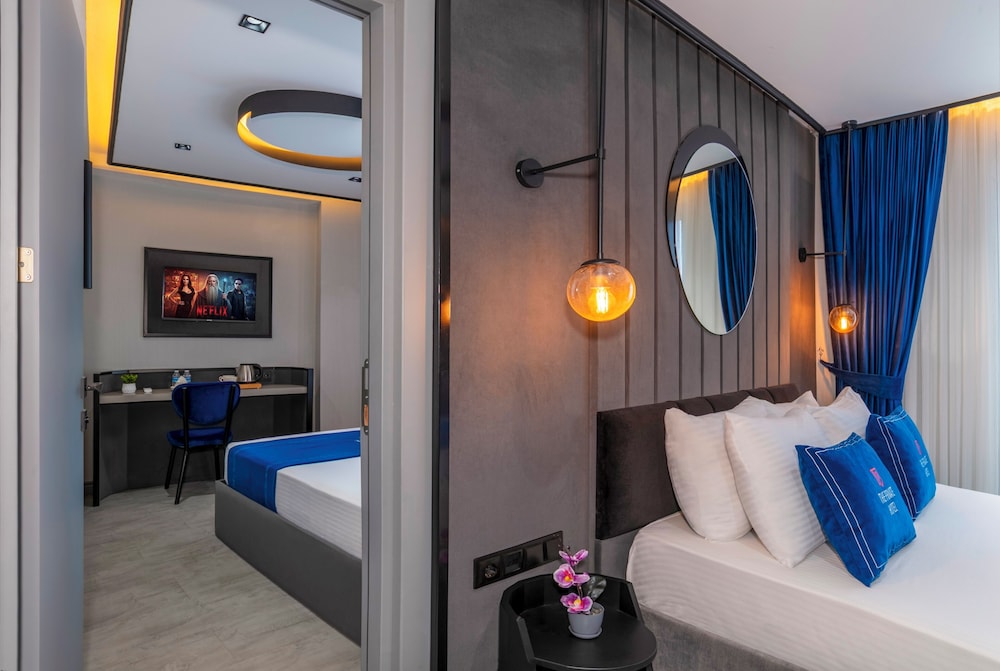 Deluxe Quadruple Room - Photo 8