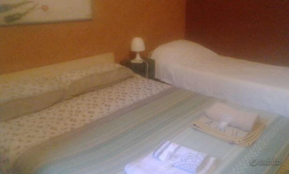 Triple Room, Multiple Beds, Non Smoking photo 1