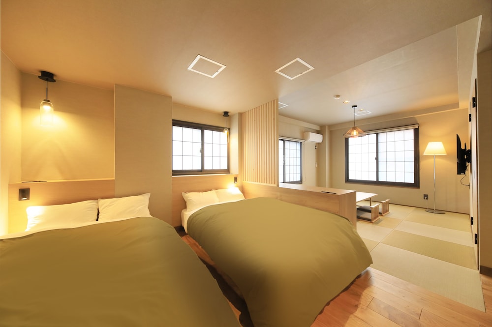 Quadruple Room, Multiple Beds - Photo 8