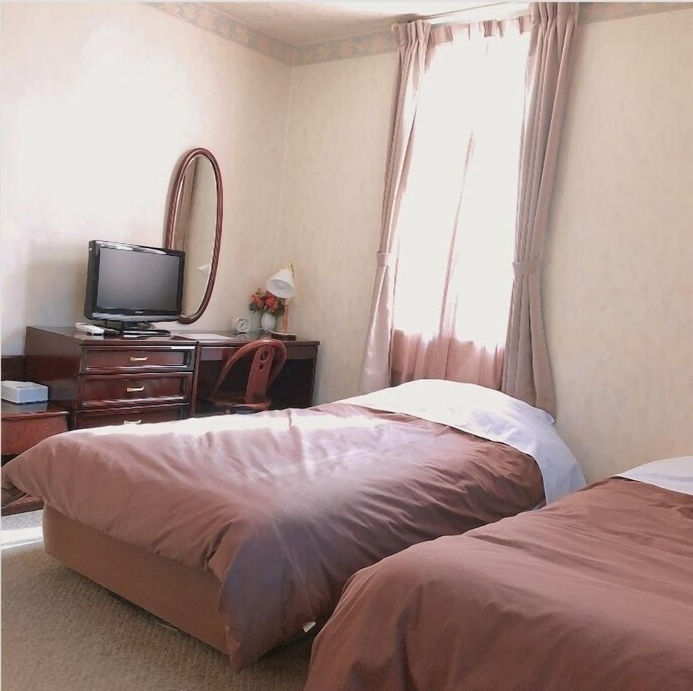 Twin Room - Photo 21