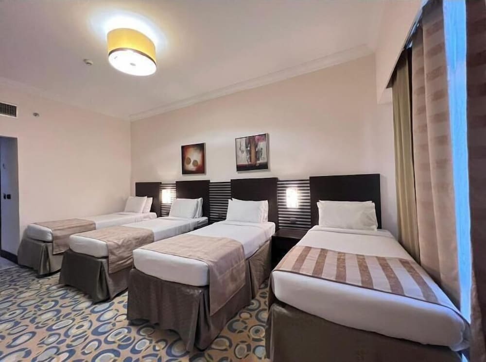 Deluxe Quadruple Room - Photo 1