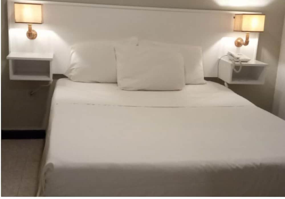 Basic Room, 1 Queen Bed, No Windows - Photo 1