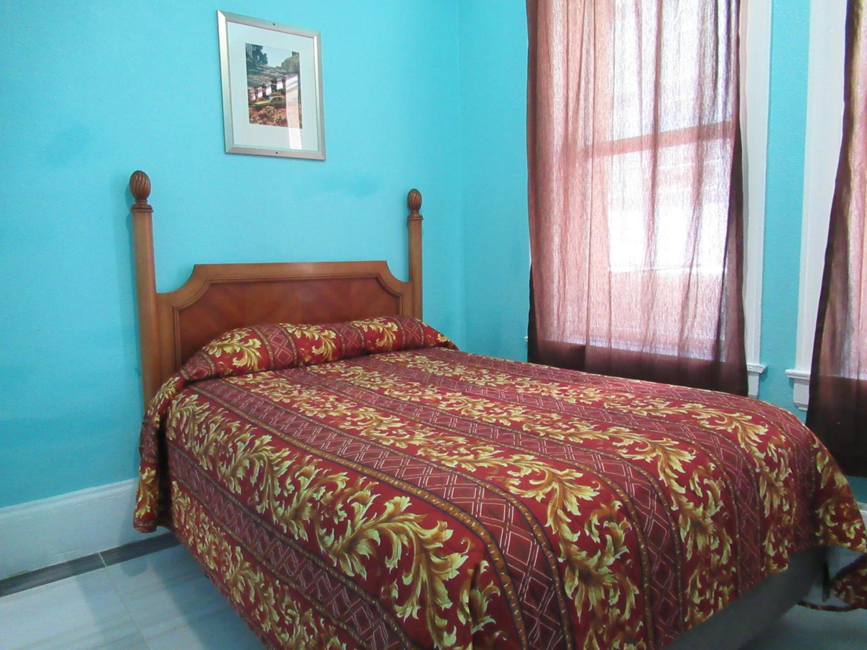 Queen Room with Shared Bathroom