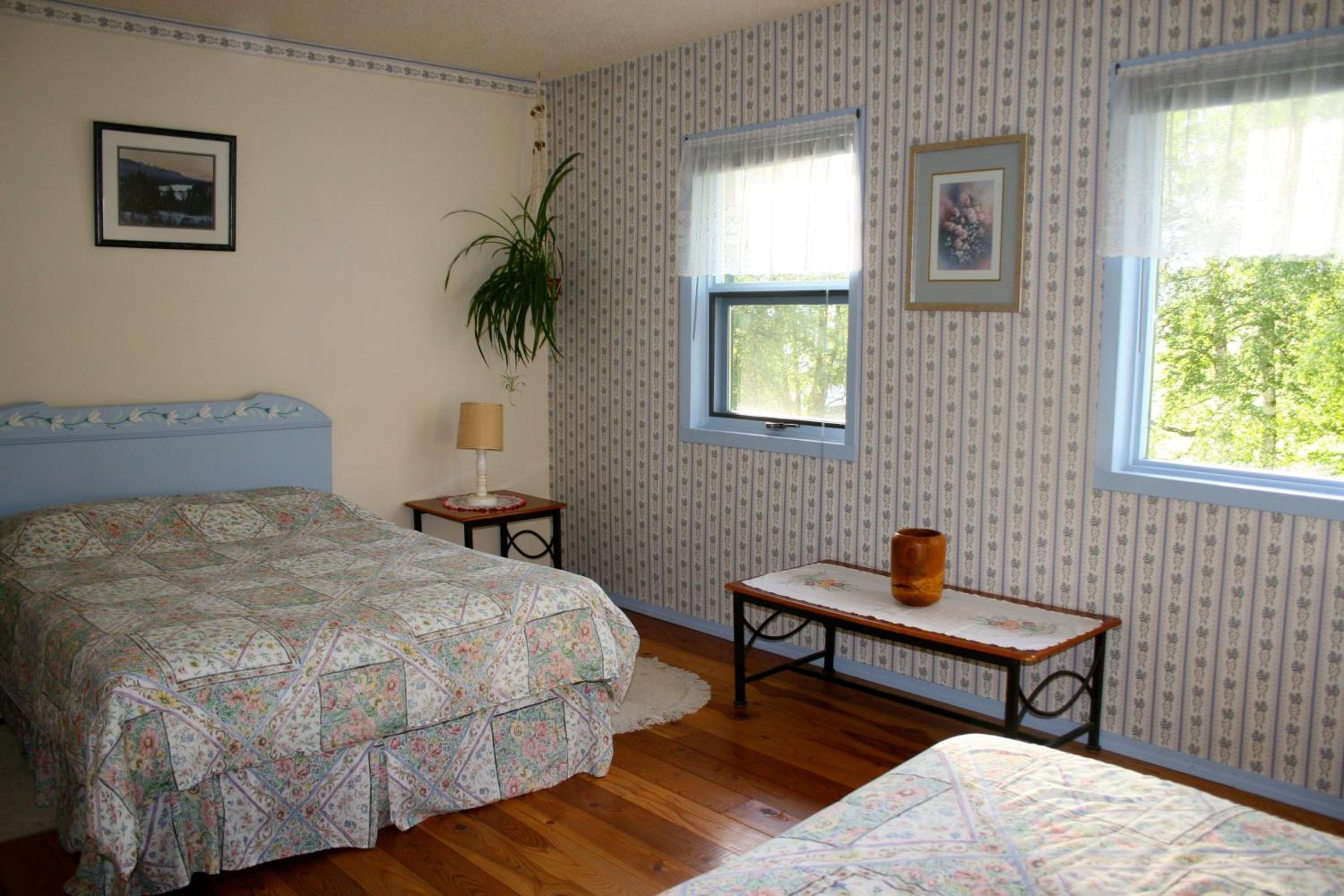 Double Room with extra bed with Shared Bathroom
