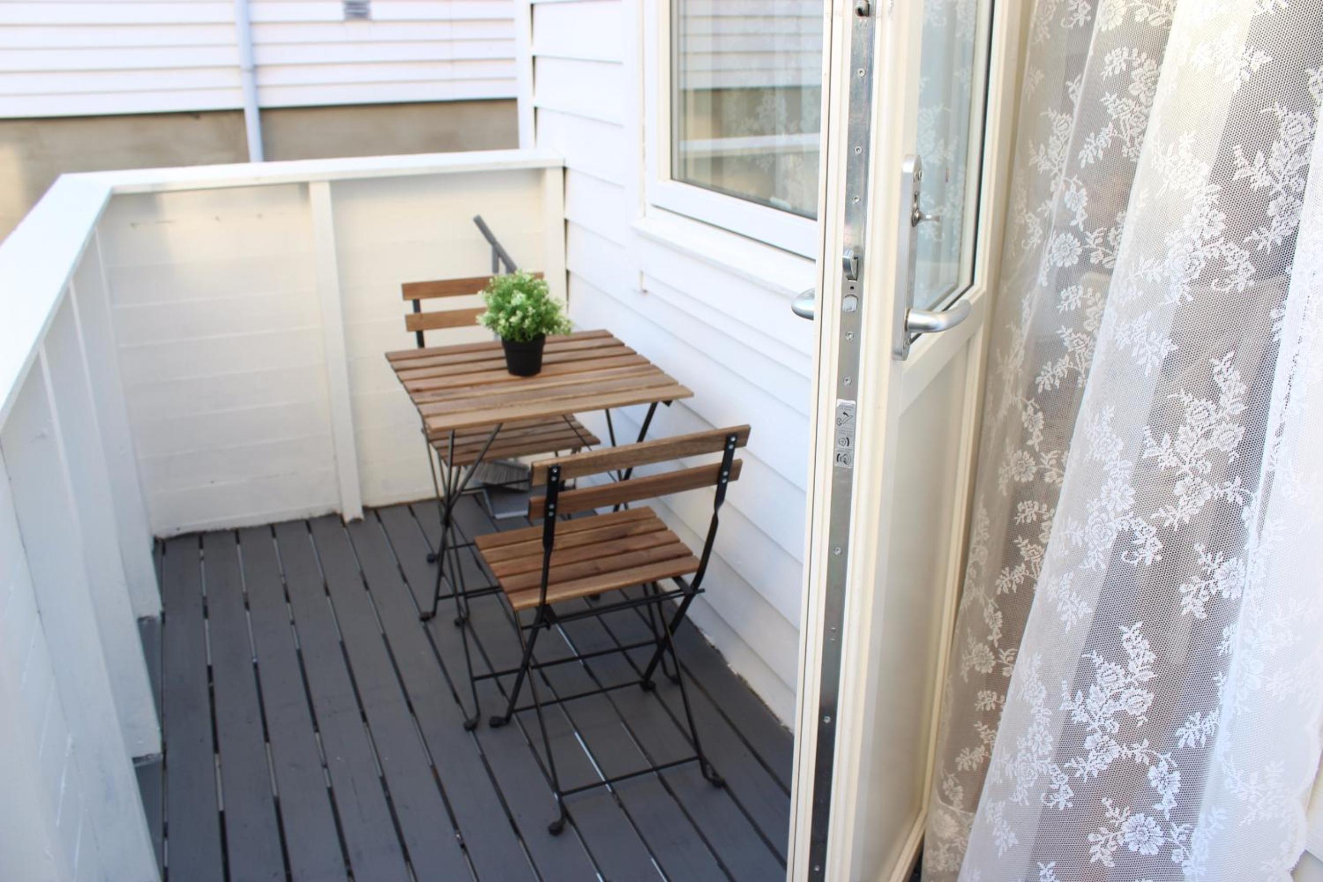 Apartment with Balcony - Photo 1