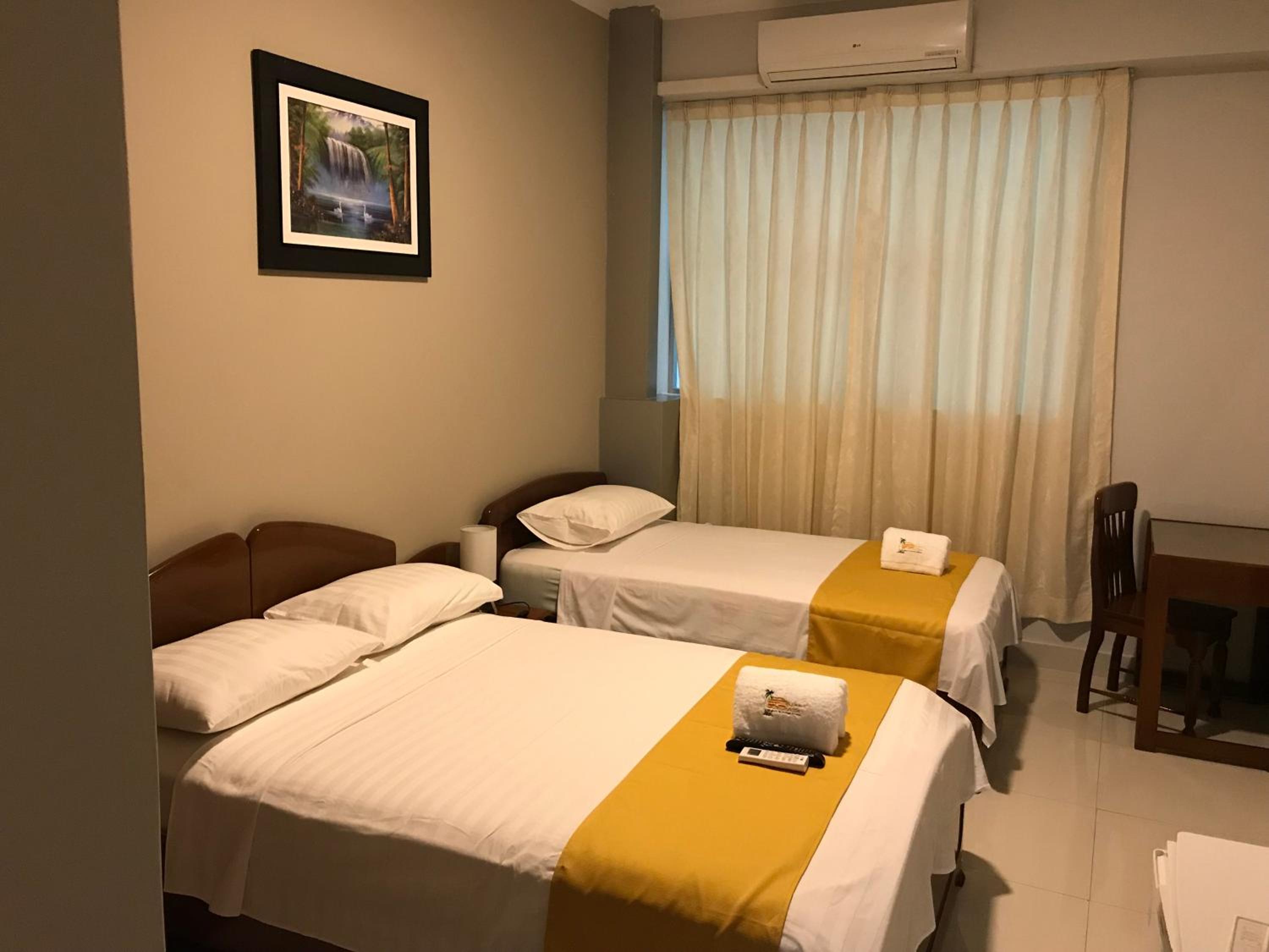 Double Room (1 Adult + 1 Child)