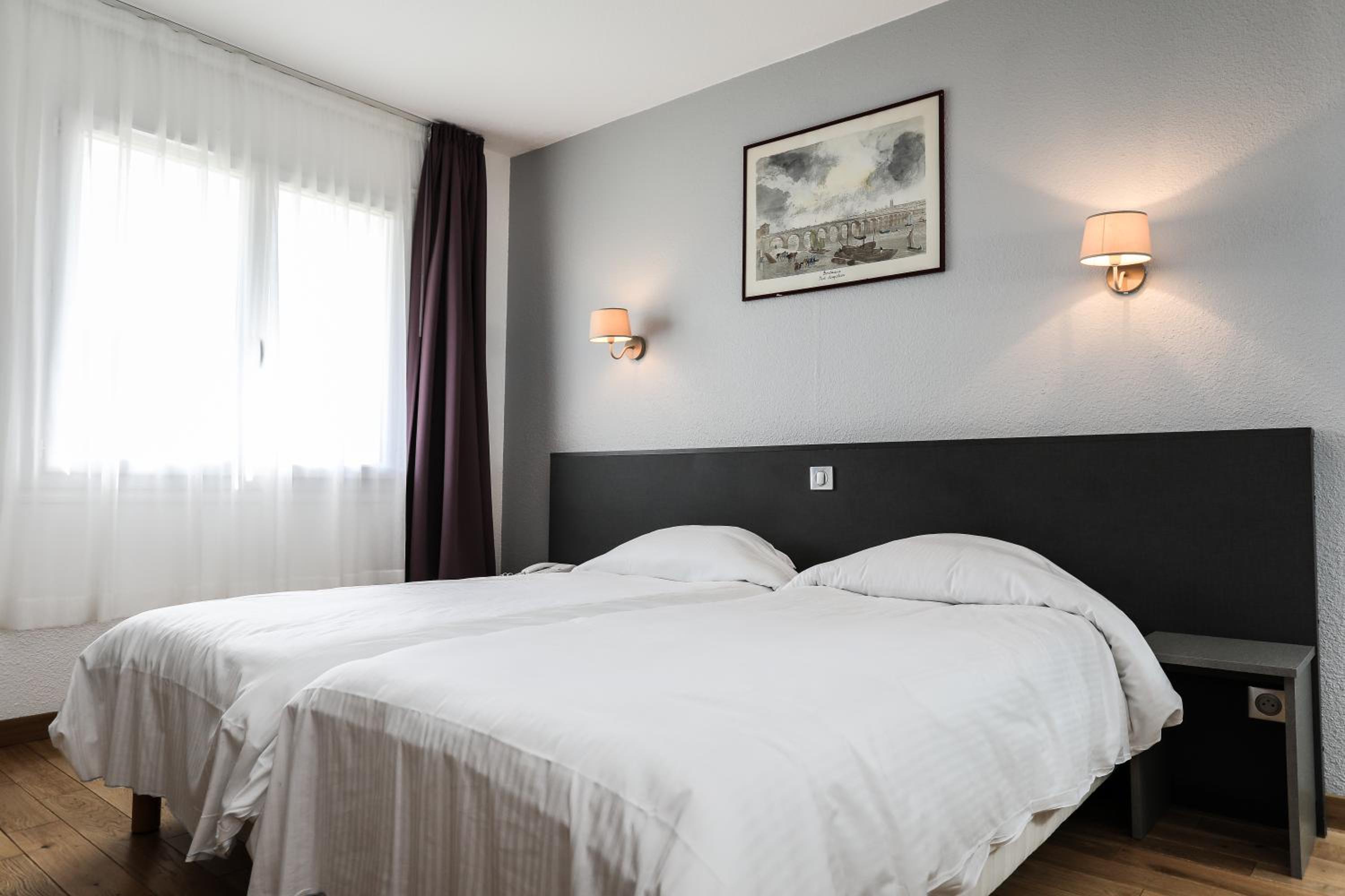 Twin Room - Photo 1