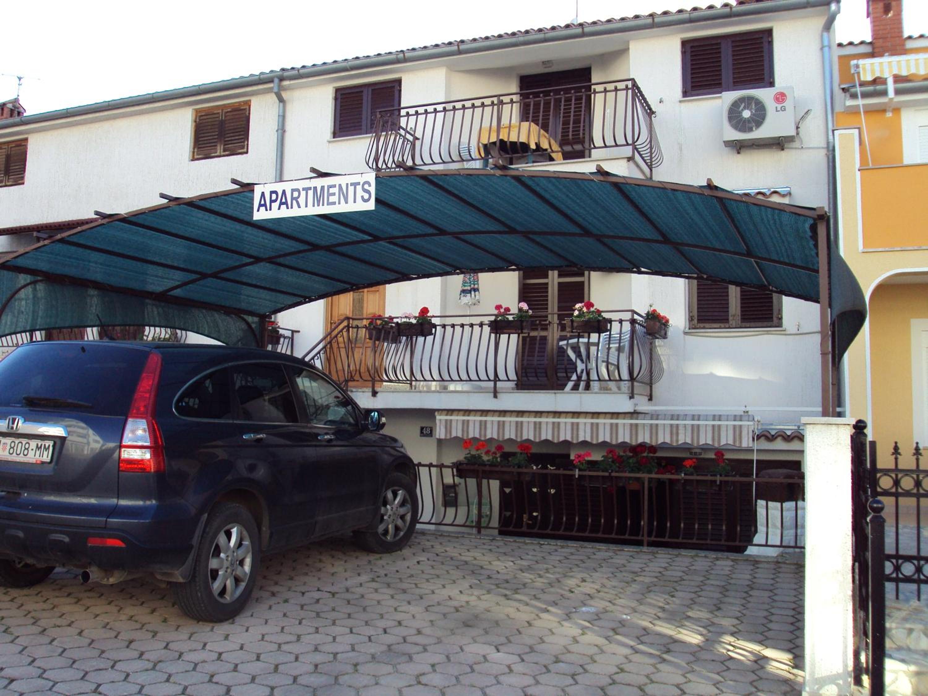 One-Bedroom Apartment with Balcony and Street View