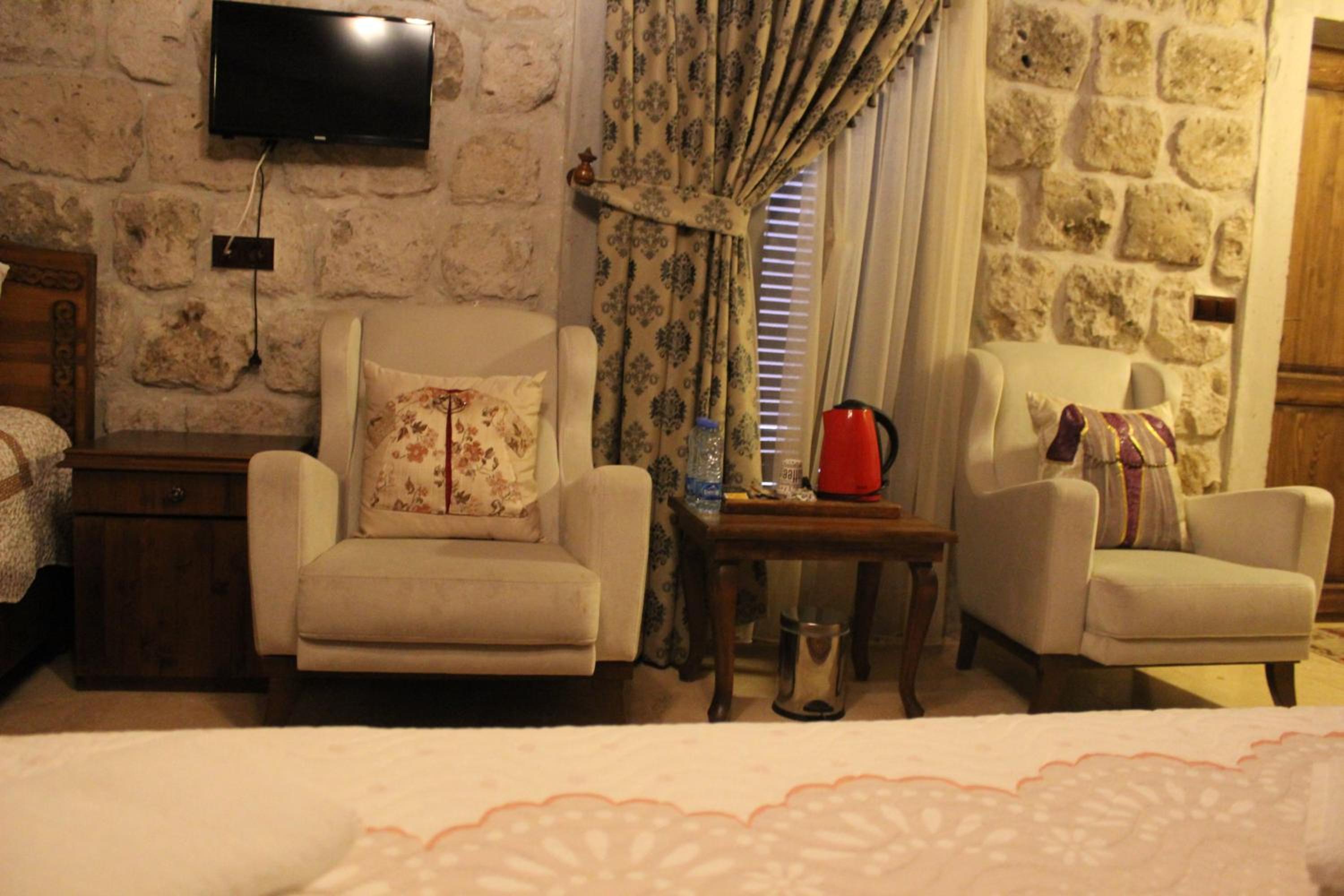 Deluxe Triple Stone Room with Courtyard View photo 1