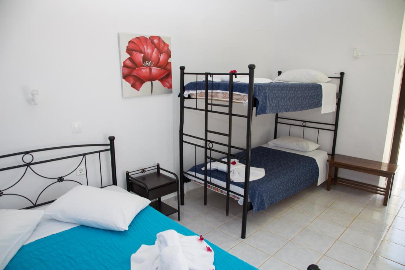 Quadruple Room with Balcony (2 Adults + 2 Children) photo 2