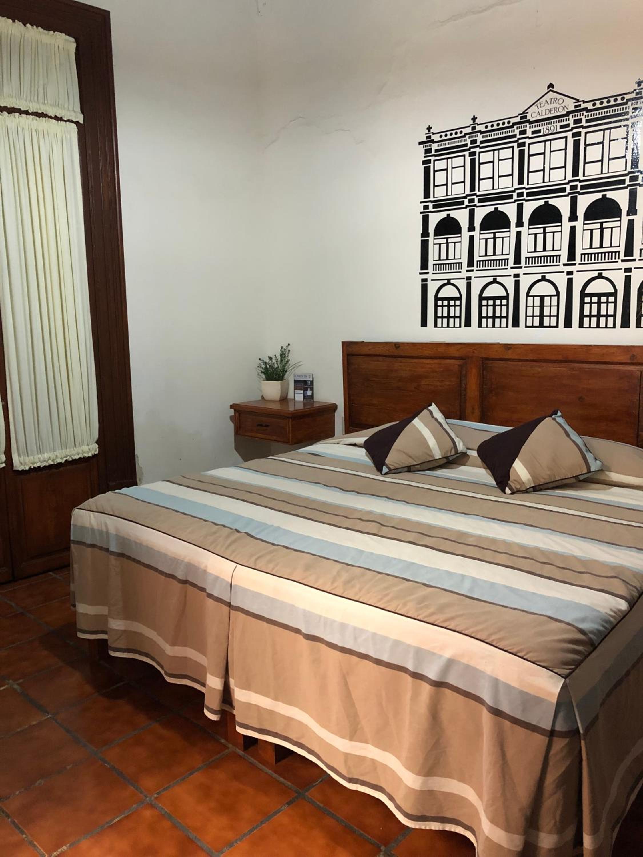 Queen Room with Shared Bathroom
