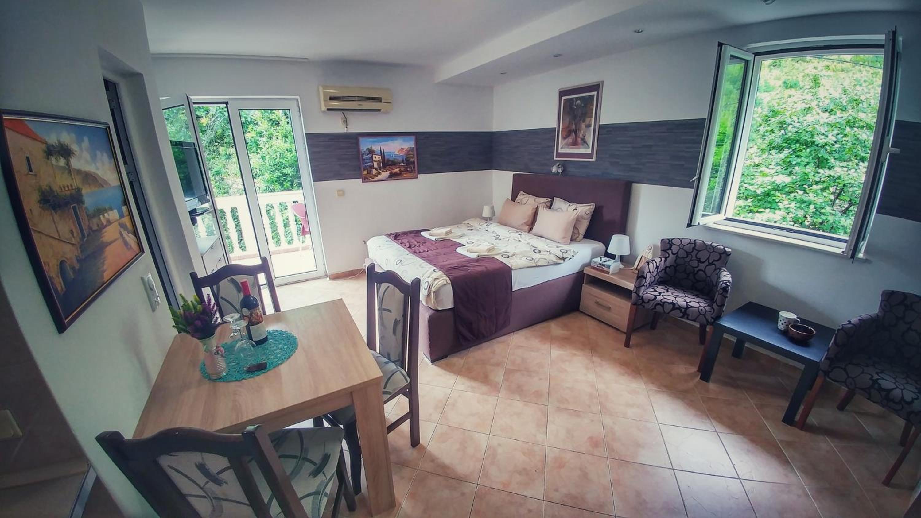 One-Bedroom Apartment with Balcony and Partial Sea View