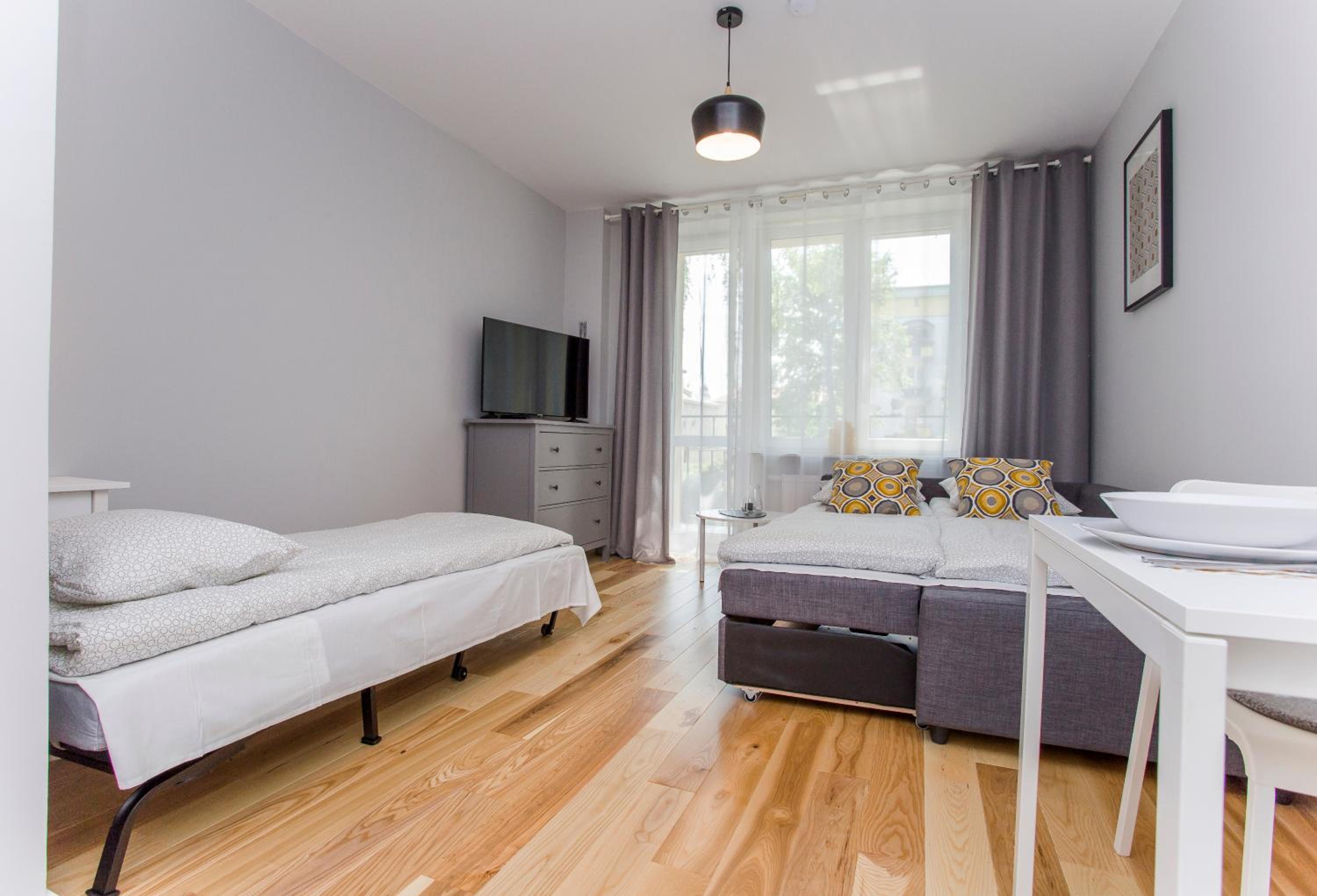 Studio Apartment with Balcony - Photo 23